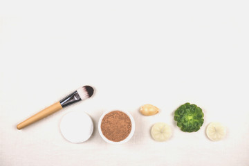 Clay mineral facial water and cosmetic tools.