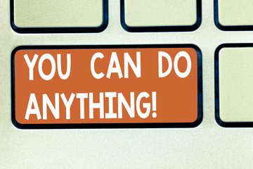 Fototapeta premium Text sign showing You Can Do Anything. Conceptual photo Motivation for doing something Believe in yourself Keyboard key Intention to create computer message pressing keypad idea