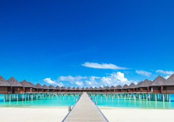 Maldives water bungalow on ocean water landscape