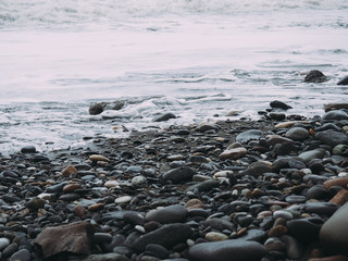 Obraz premium Sea pebble on the beach. stones background.