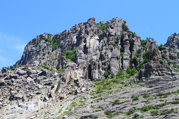 cute mountain slope with blue sky, natural landscape photo