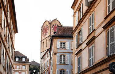 Fototapeta premium Diesse Tower clock tower among old buildings in Medieval ancient town of Neuchatel