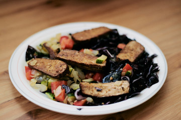 Smoked tofu with sesame and chopped vegetables