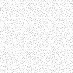 Seamless background with random light elements. Abstract ornament. Dotted abstract pattern