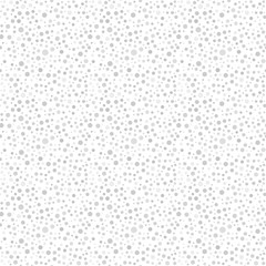 Seamless background with random light elements. Abstract ornament. Dotted abstract pattern