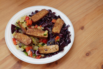 Smoked tofu with sesame and chopped vegetables