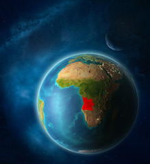 Angola from space on planet Earth in space with Moon and Milky Way. Extremely fine detail of planet surface.