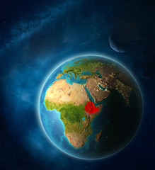 Ethiopia from space on planet Earth in space with Moon and Milky Way. Extremely fine detail of planet surface.