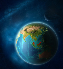 Malaysia from space on planet Earth in space with Moon and Milky Way. Extremely fine detail of planet surface.