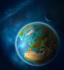 Poland from space on planet Earth in space with Moon and Milky Way. Extremely fine detail of planet surface.