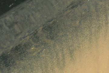 An abstract combination of steel and mud