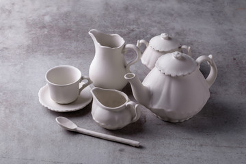 Teapot creamer, Cup and saucer on Cement Board
