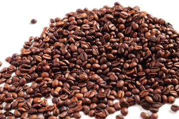 Roasted coffee beans on white background, isolated