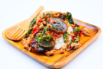 Basil leave with minced pork and fried preserved egg