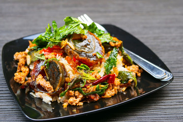Basil leave with minced pork and fried preserved egg