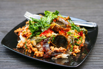 Basil leave with minced pork and fried preserved egg