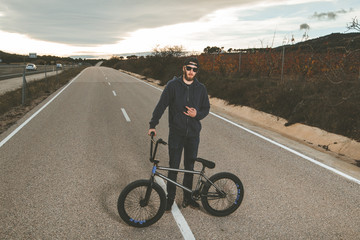 BMX rider. Young man with a bmx bike. Extreme sports