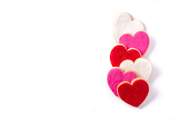Heart-shaped cookies for Valentine's Day isolated on white background. Copyspace