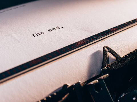 old typewriter with text 'the end'