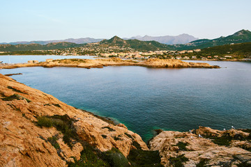 Ille Rouse aerial view of the city and mountains from the lighthouse after sunset on Corsica