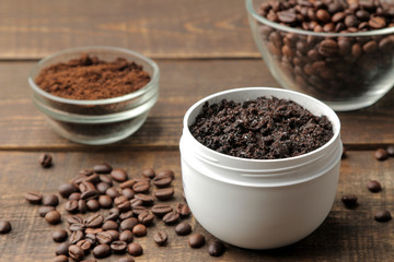 homemade coffee scrub in a white jar for the face and body and various ingredients for making scrub. spa. cosmetics. care cosmetics