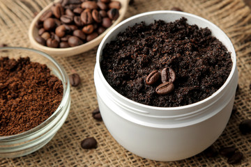 homemade coffee scrub in a white jar for the face and body and various ingredients for making scrub. spa. cosmetics. care cosmetics