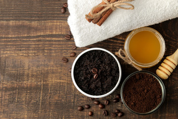 homemade coffee scrub in a white jar for the face and body and various ingredients for making scrub. spa. cosmetics. care cosmetics. top view with space for text