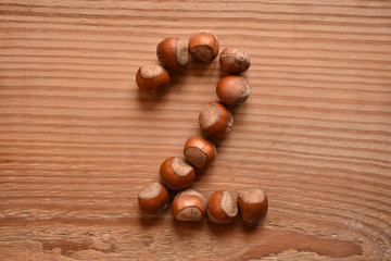 the number 2 shaped with hazelnuts