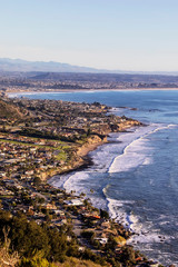 City Below meets Ocean at Coastline