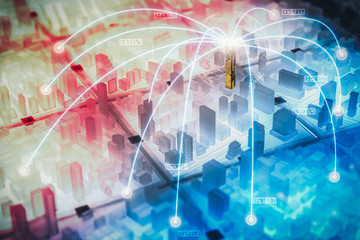 The abstract image of the miniature cityscape image overlay with networking virtual hologram. The concept of modern life, communication, business, city life and internet of things.