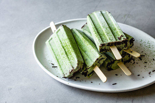 Matcha and  mint chocolate chip popsicles