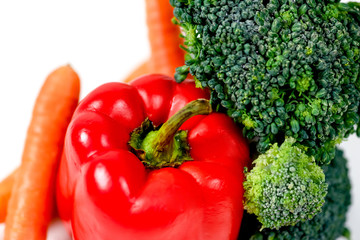 a fresh group of vegetables on white background