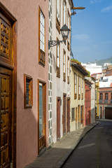 Fototapeta na wymiar Vertical photo of colorful old style houses of Tenerife