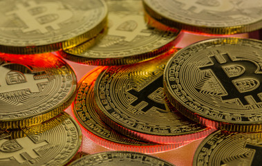 Bitcoin Crash - Cryptocurrency Bitcoins on a vibrant red surface