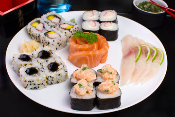 Japanese food combo of sushis and sahimis