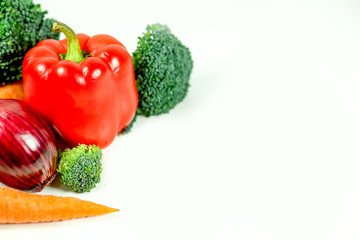 a fresh group of vegetables on white background