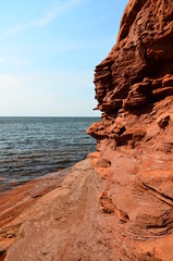 Red cliffs and sea