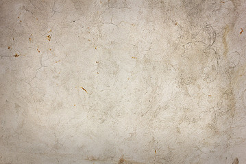 texture of an old gray concrete wall close-up in spots and scratches