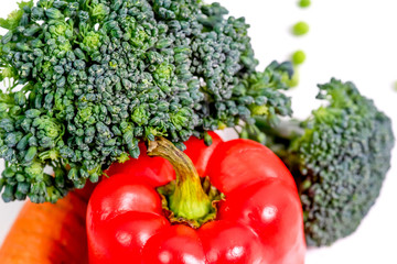 a fresh group of vegetables on white background