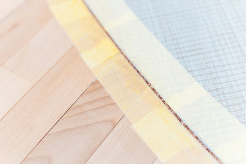 Perform flooring work - installation of a liquid plug into the joint between tile and parquet