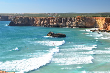 surfers in mediterranean sea