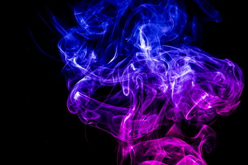 Colored smoke on black background