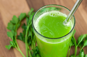 Fresh, Homemade Celery Apple Juice with Stainless Steel Drinking Straw