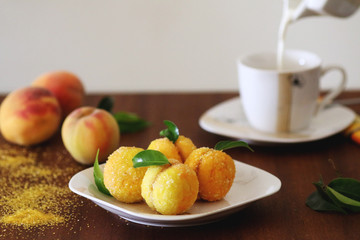 Peach shaped cookies with nut and caramelized milk inside
