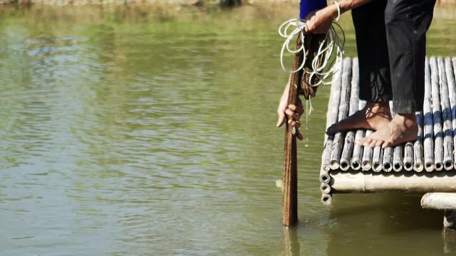 People Pulling a Fishing Net at lake, slow motion