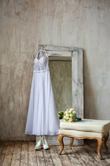 Fototapeta na wymiar wedding dress on the hanger