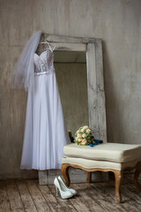 Fototapeta na wymiar wedding dress on the hanger