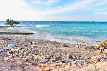 Fototapeta na wymiar Garbage and Dirty Waste on Beach in Koh Larn