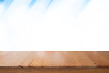 Empty desk with blue gradient blurred bokeh abstract background