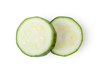 Slice of zucchini isolated on white background. top view